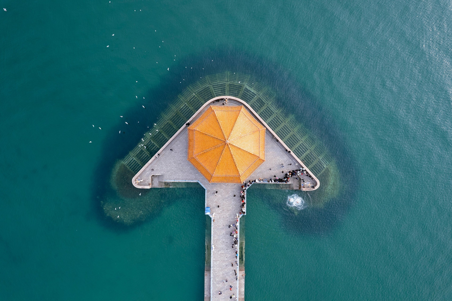 Maldives overwater villas viewed from above showing typical resort island layout