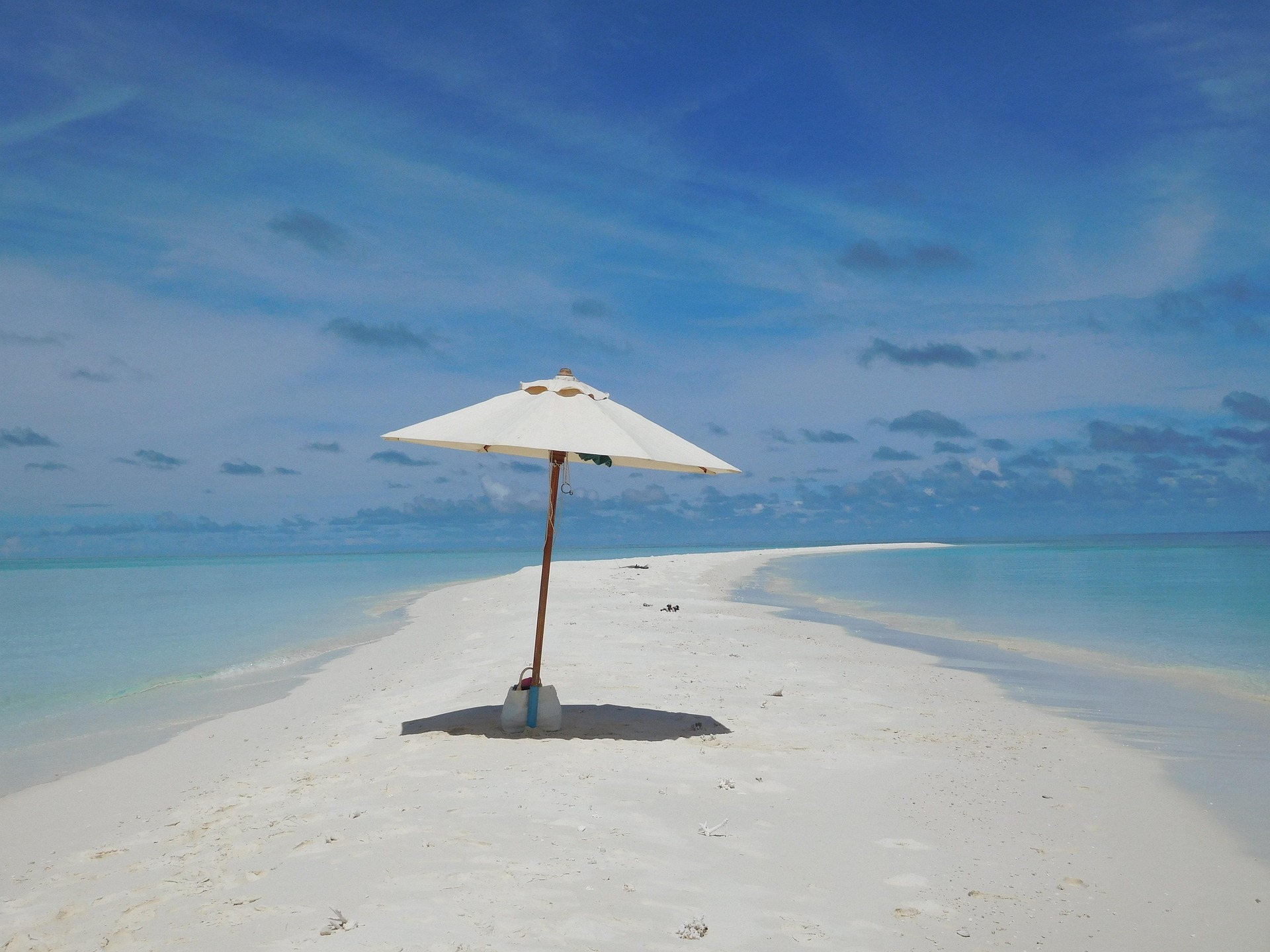 Maldives local island beach showing budget-friendly travel option