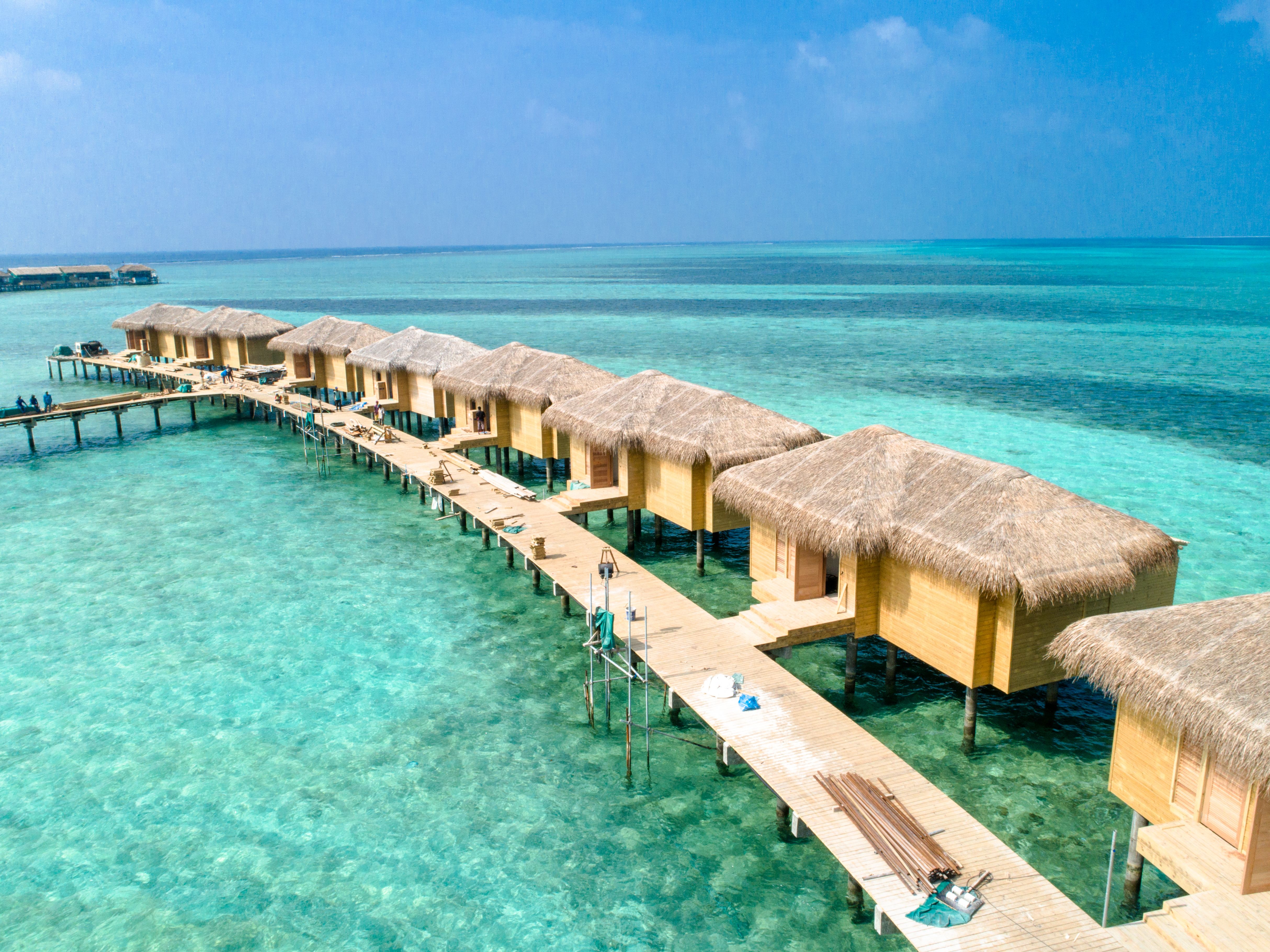 Maldives overwater villas and turquoise lagoon