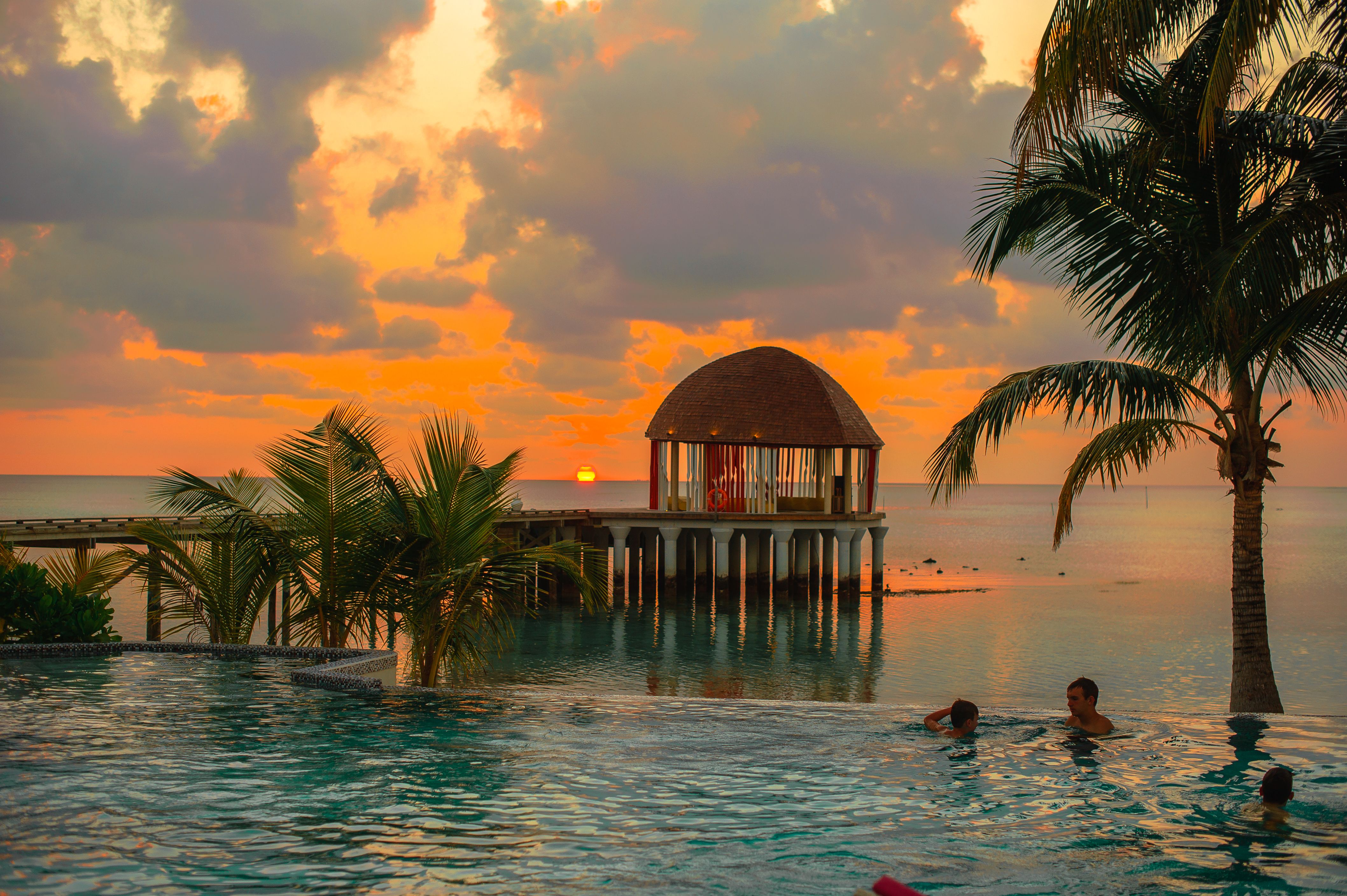 Maldives resort beach representing a well-planned Maldives tour itinerary