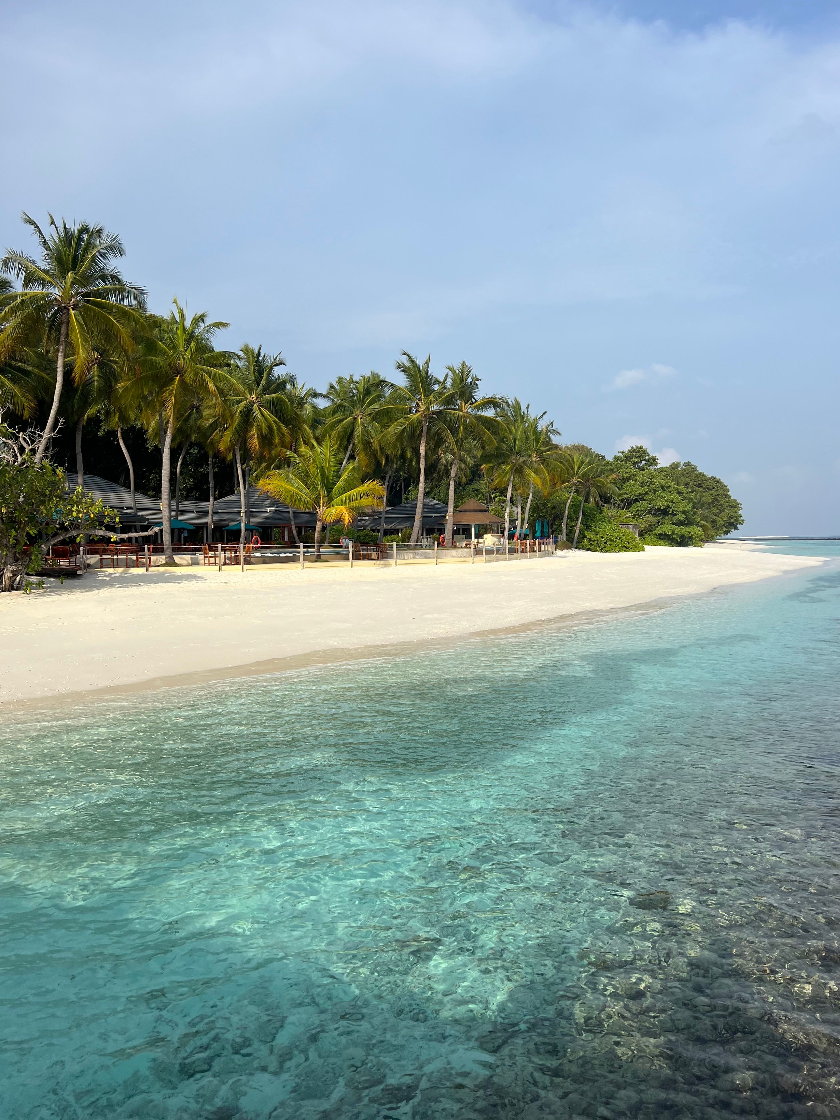 Maldives resort beach and lagoon, representing trip cost tiers